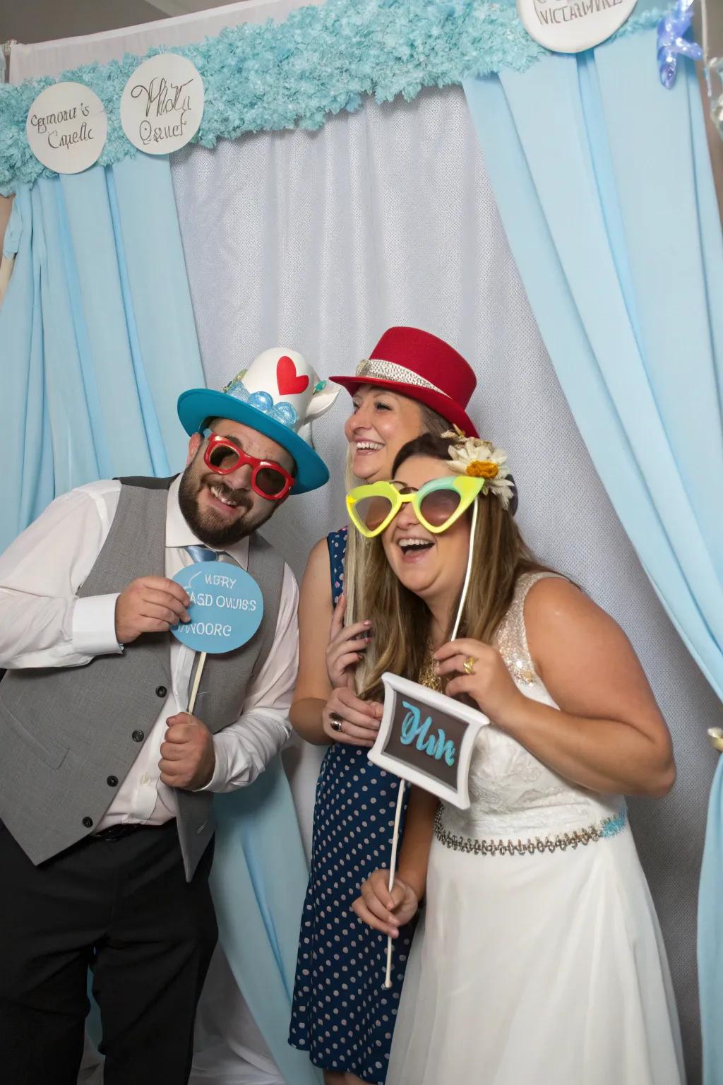 A blue-themed photo booth crafts entertaining and unforgettable moments.