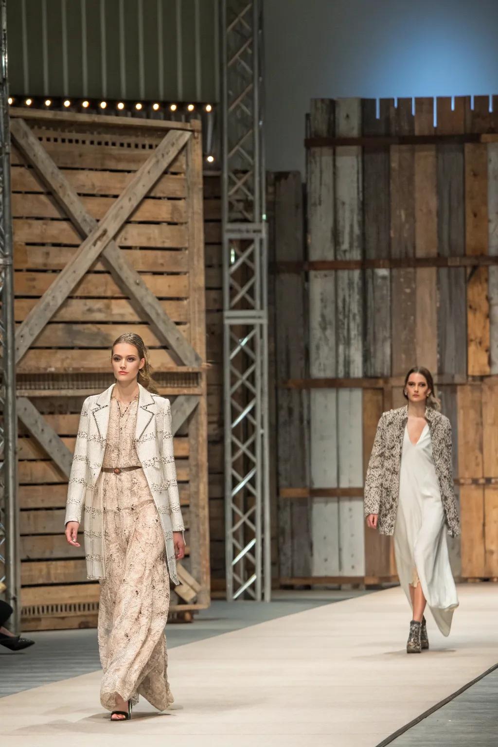 Textured panoramas of wood and metal add richness to the fashion runway.