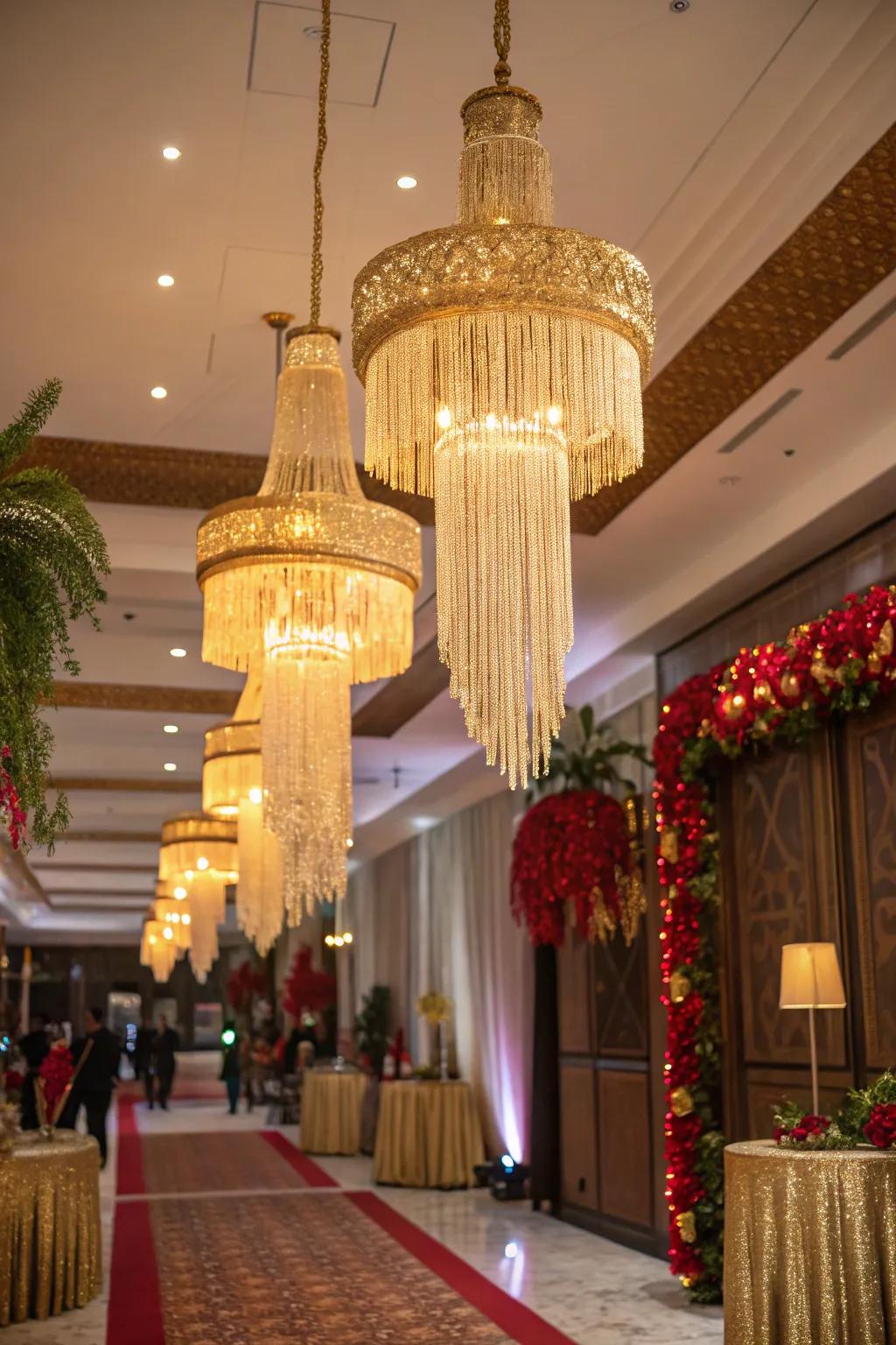 Golden tassel chandeliers contribute fluidity and shimmer.
