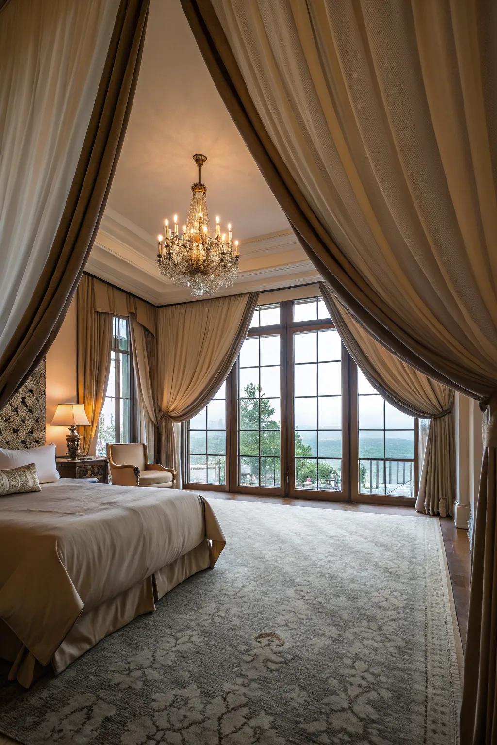 Dramatic window coverings amplify the stylishness and spatial perception of this expansive bedroom.