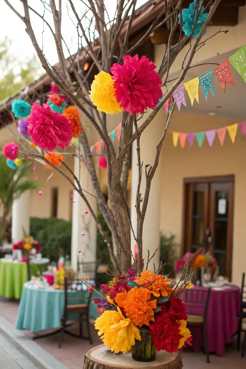 Lively fiesta featuring vivid colors and paper blossoms on manzanita limbs.