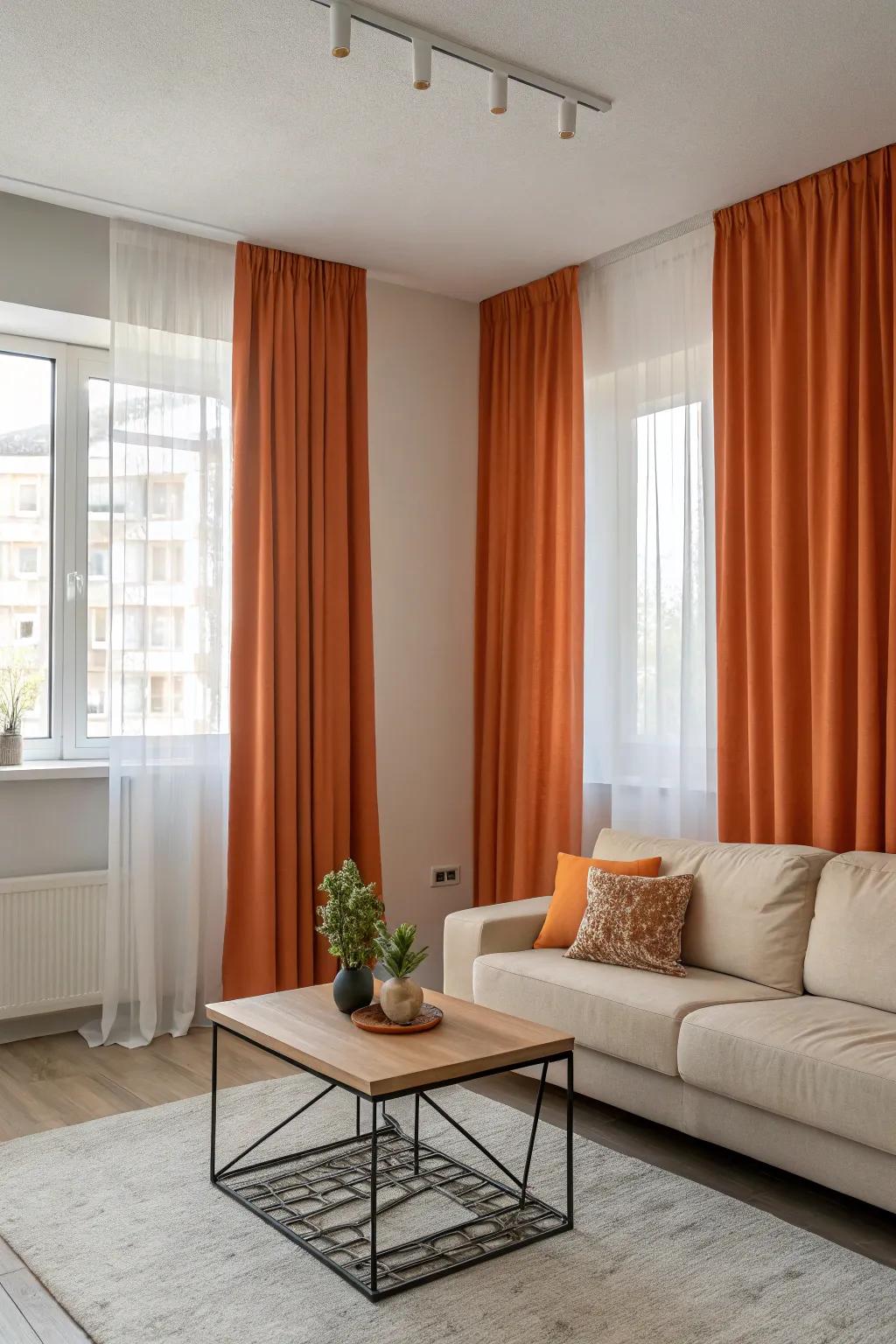 Minimalist style with solid orange window coverings as a color accent.
