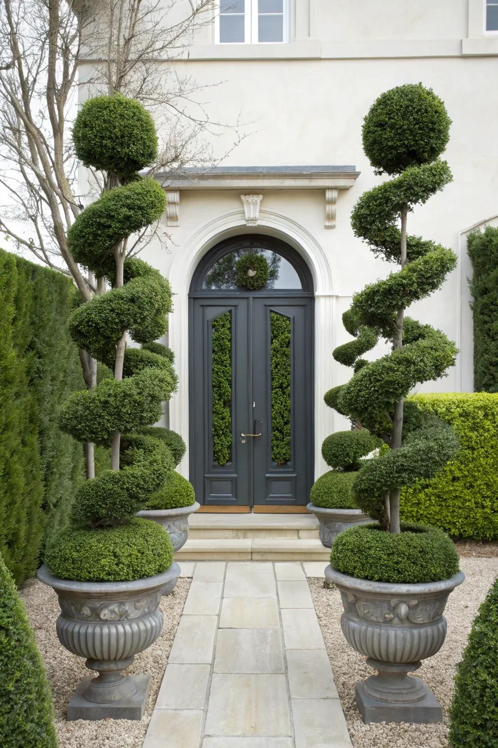 Add structure and elegance using topiary displays.