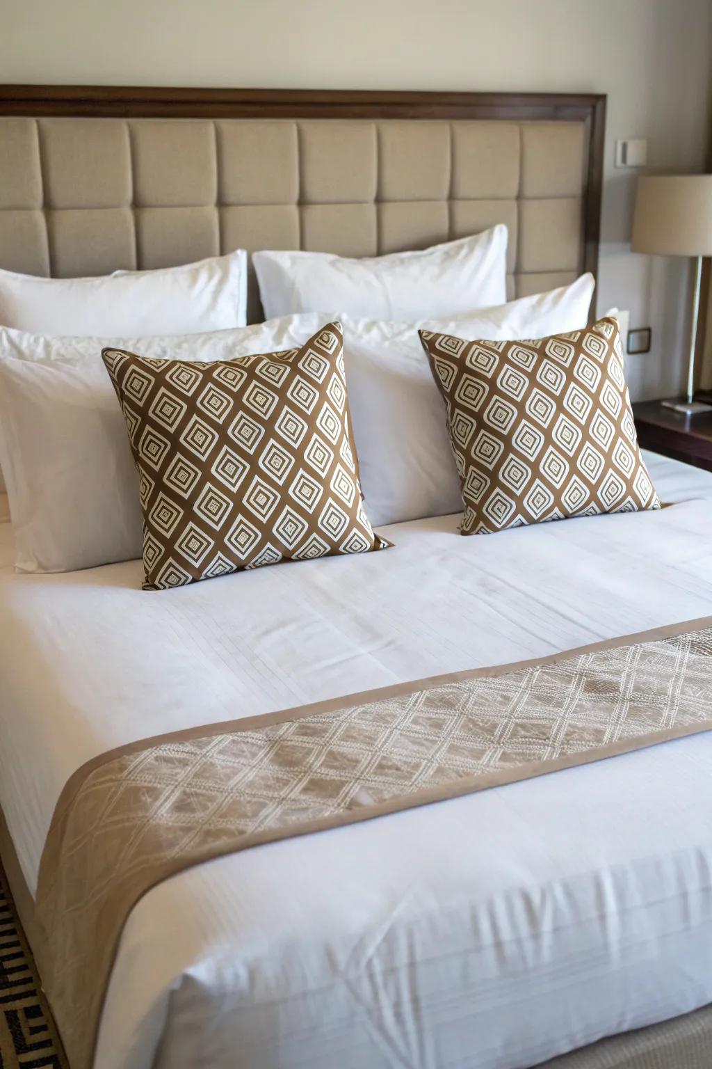 Symmetrical cushion arrangement bringing a sense of balance to the bed.