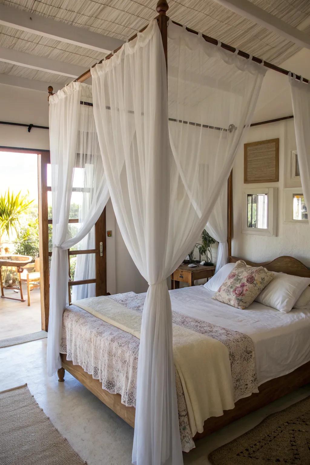 Sheer coverings on a four-poster bed maintain a light and airy ambiance.