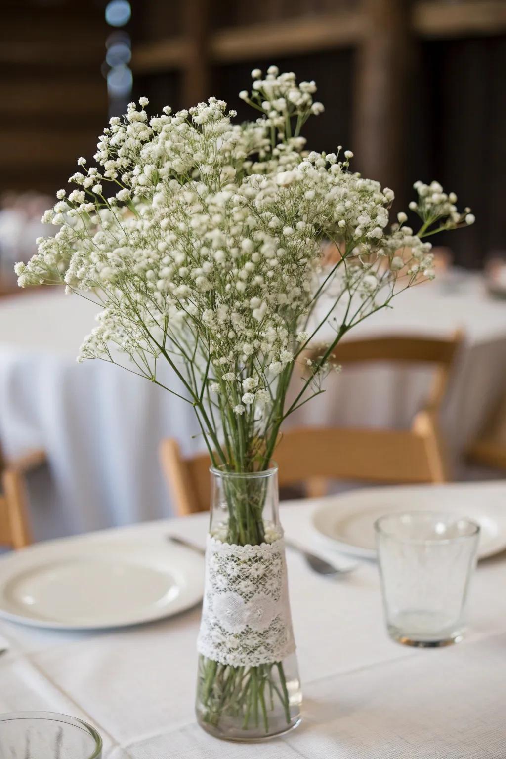 An airy Mist Flower centerpiece that doesn't stretch the budget for a wedding.
