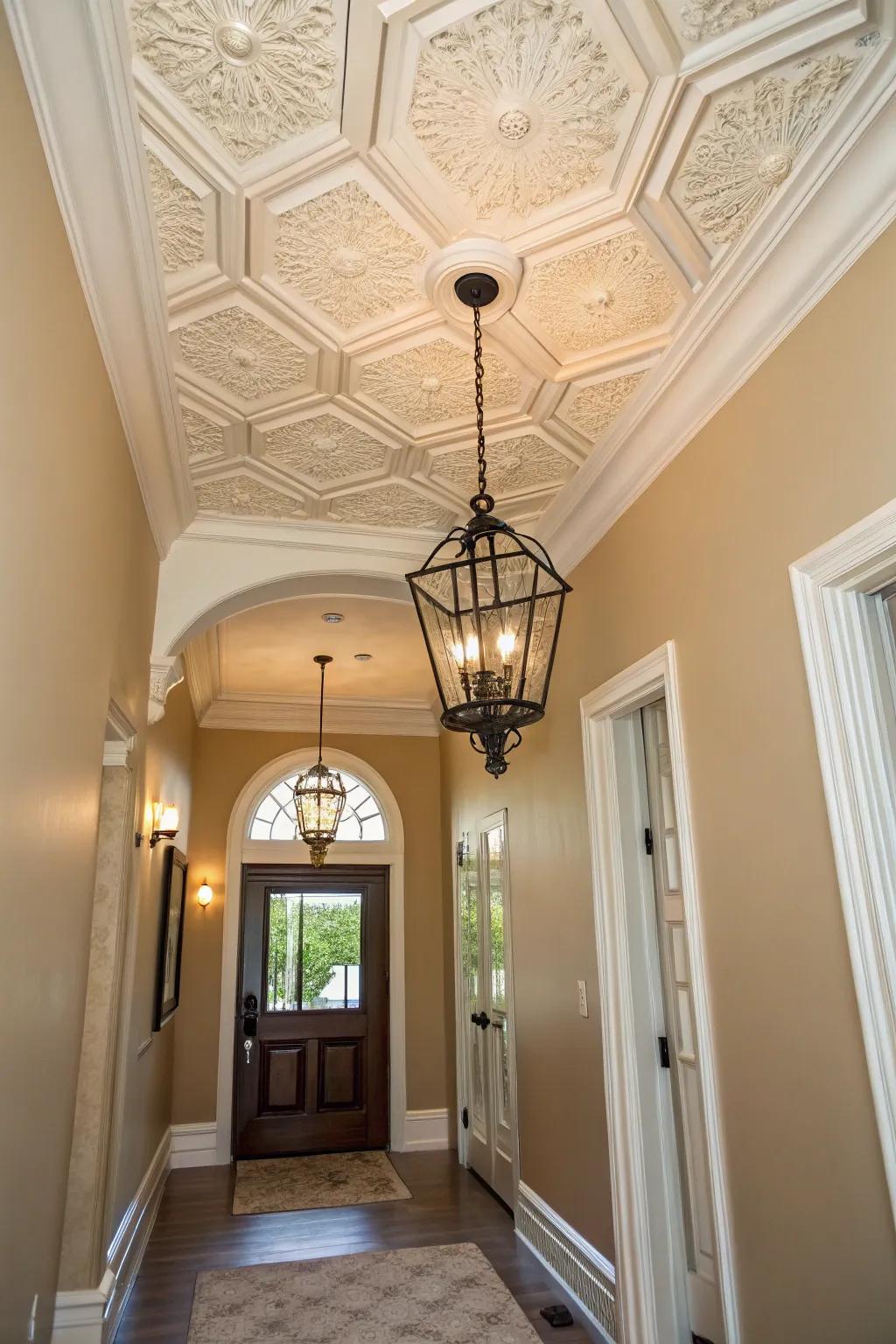 Molding on the ceiling takes the entryway to a new level of luxury.