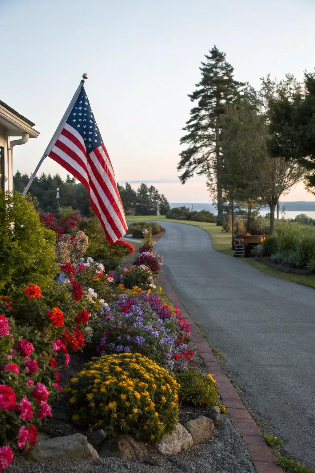 A rear lot access road bordered by bright flowers and shrubs, crafting a scenic entryway.