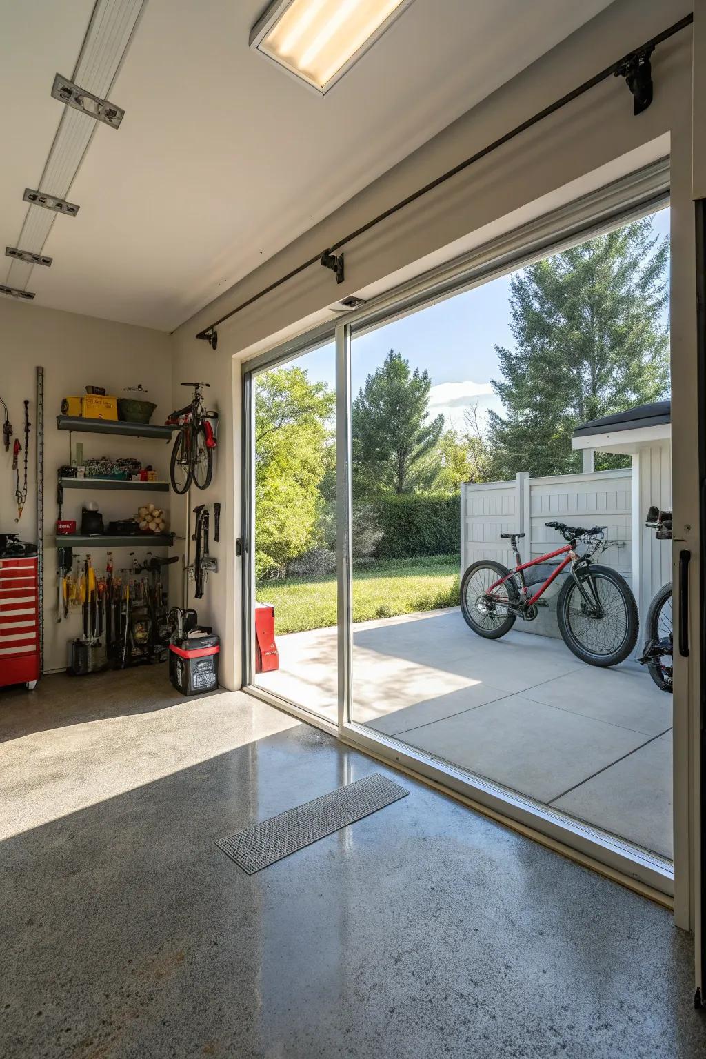 A sunlit garage space enhanced with a glass garage door.