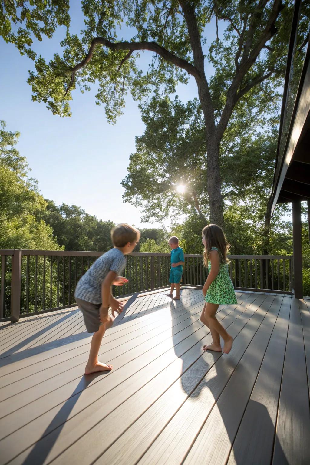 Kids enjoying barefoot playtime on a polished engineered deck, illuminated by dappled sunlight.