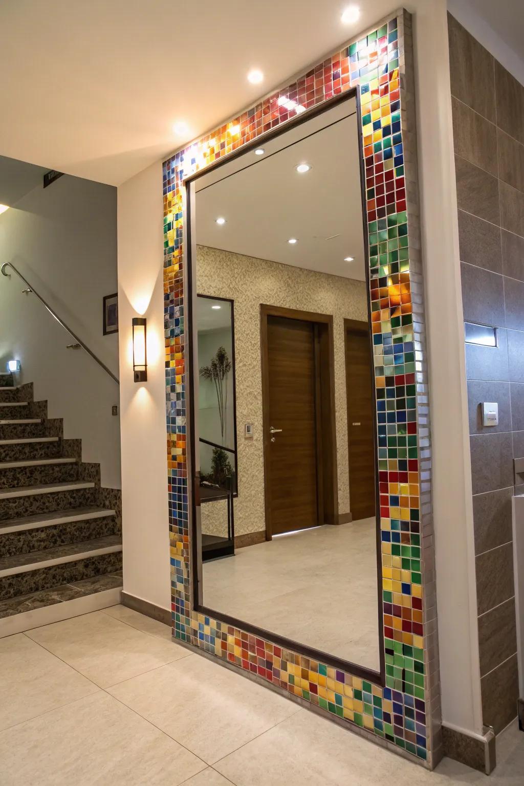 A lively tesserae tile surround mirror brightens a contemporary foyer.