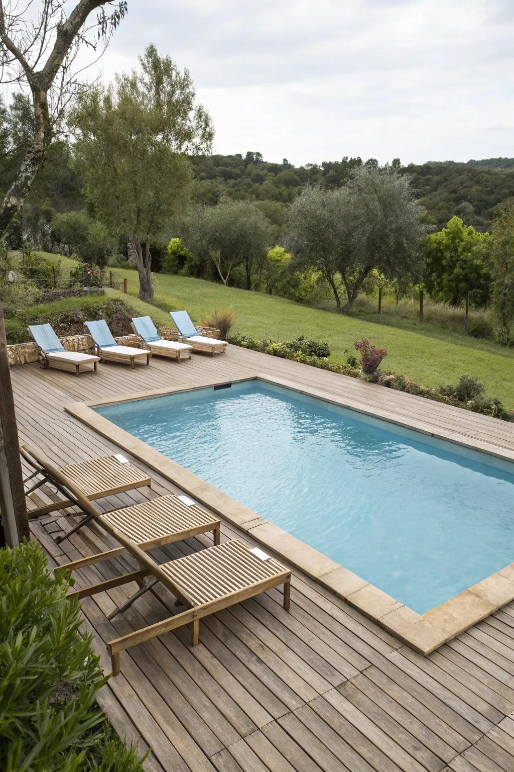 Wood decking introduces a cozy and natural atmosphere to the pool's edge.