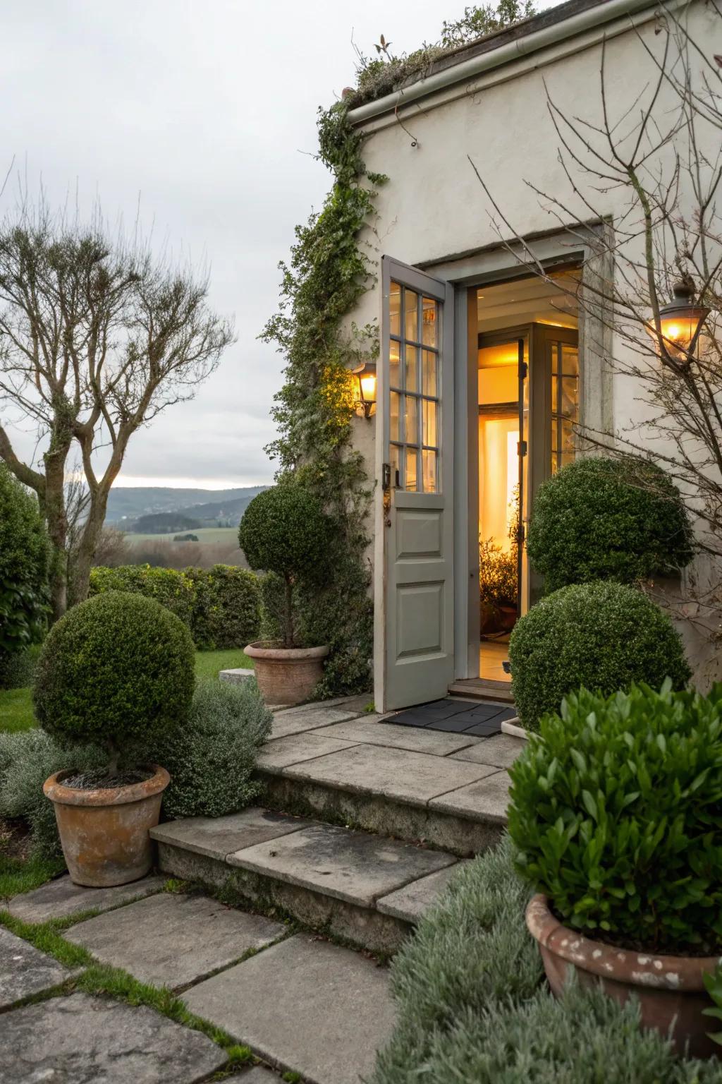 Container plants adding a natural element to the side entrance.