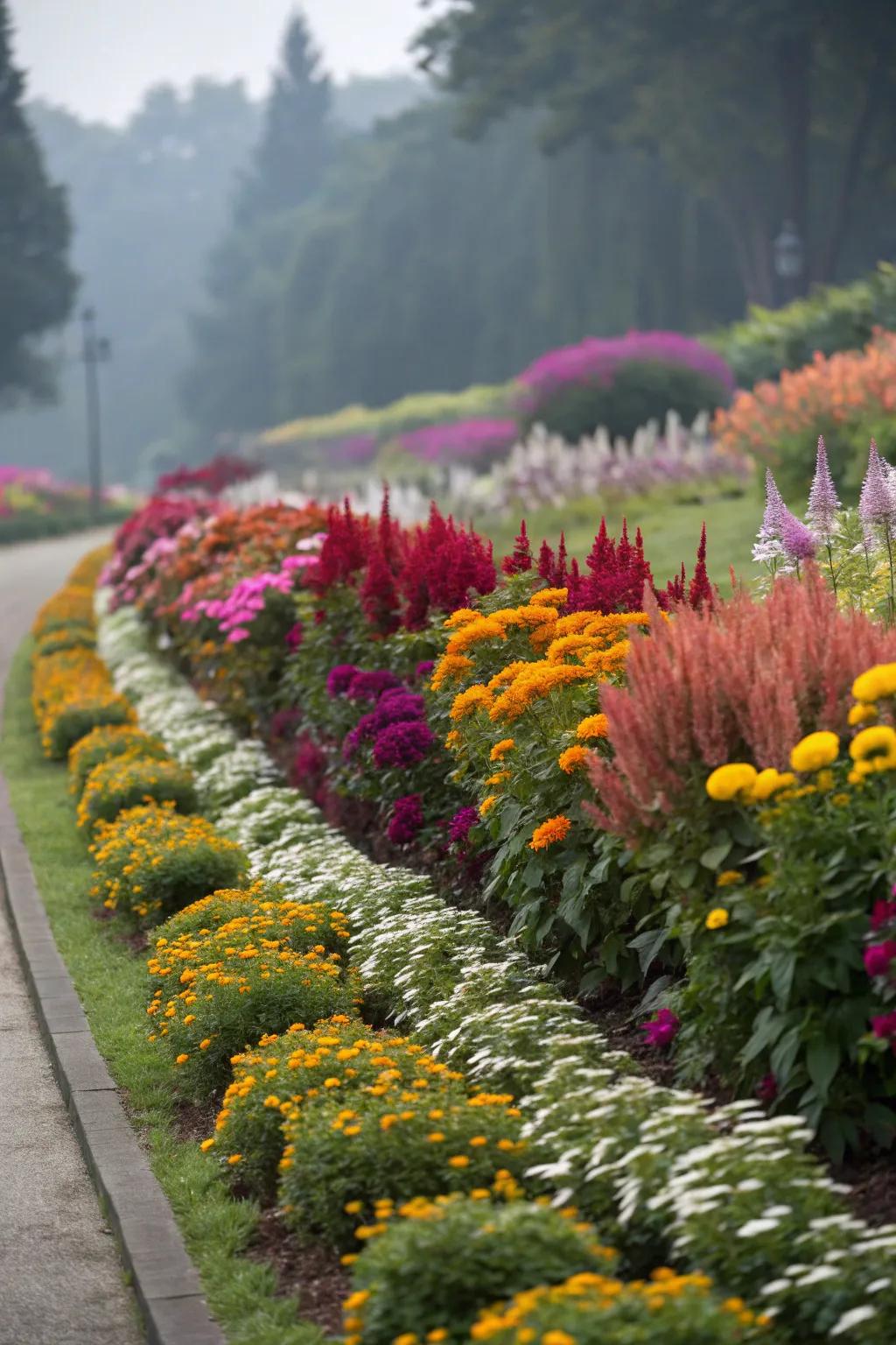 Structured planting introduces depth and an animated blend of shades to this flower bed.