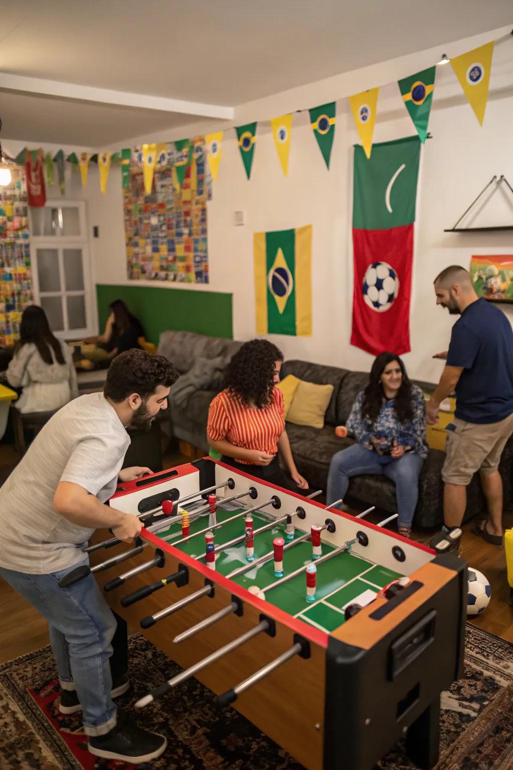 During a World Cup party, guests are enjoying a vibrant game of table soccer.