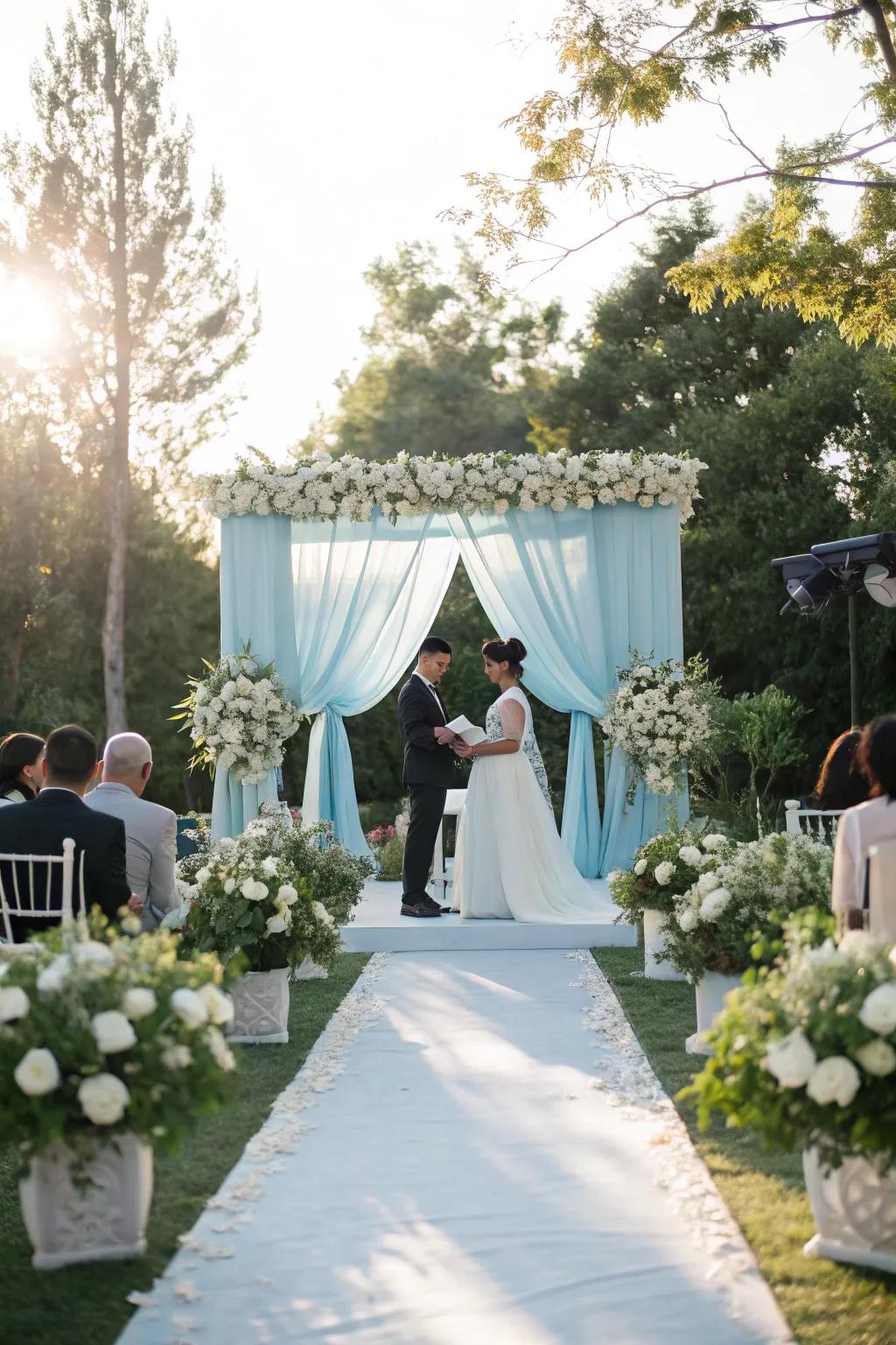 A soft blue backdrop fashions a romantic setting for your vows.