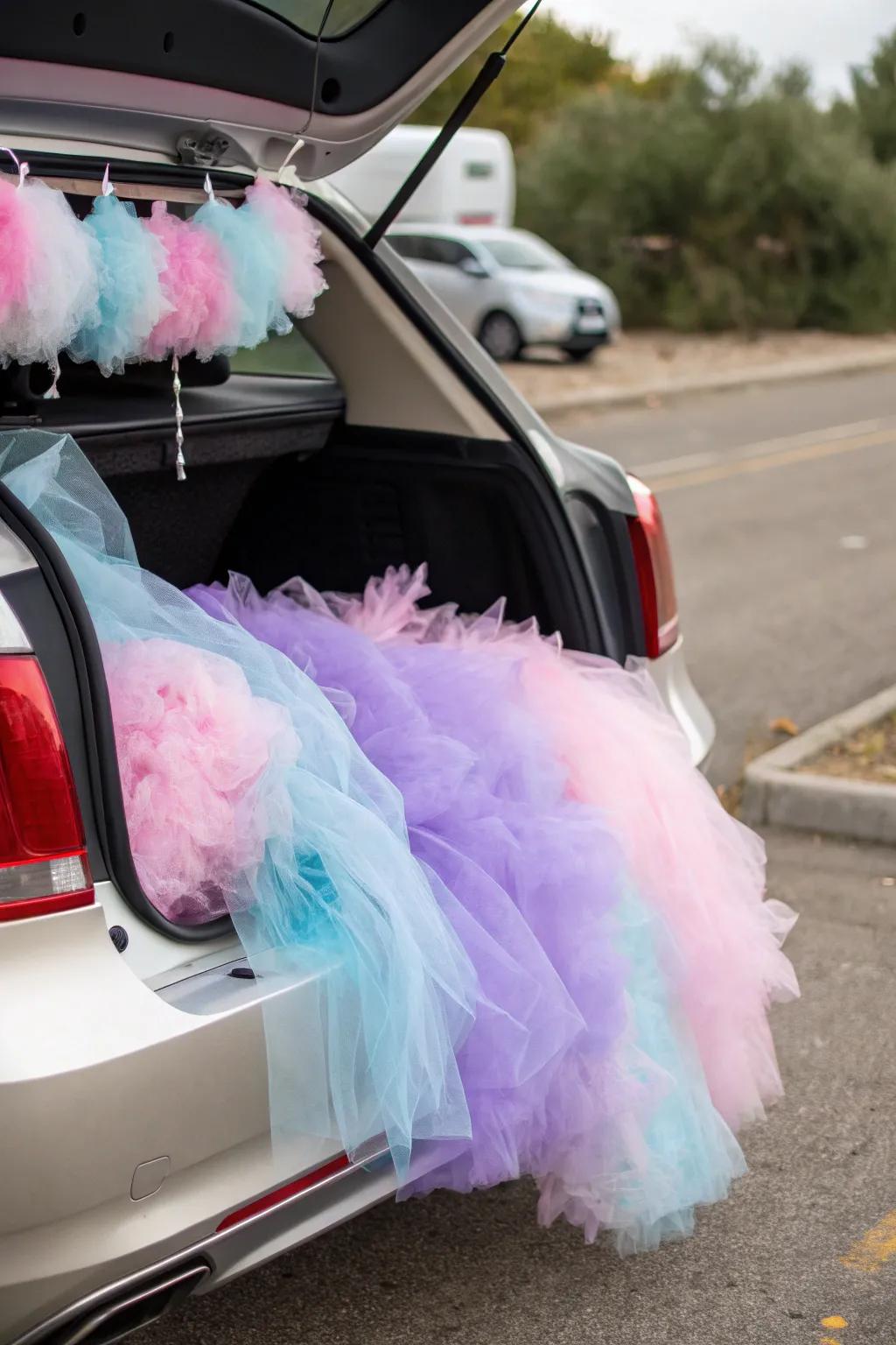 A whimsical cotton candy-inspired trunk, embellished with pastel tulle and cotton.