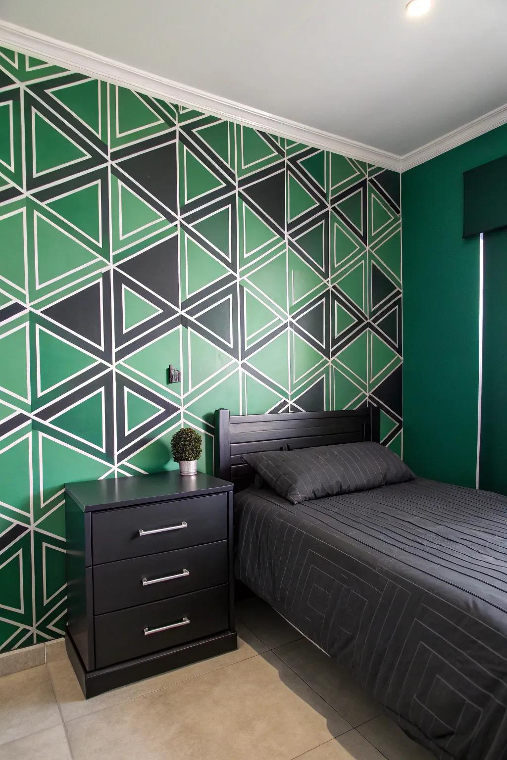 Green and charcoal geometric wallpaper introduces a modern touch.