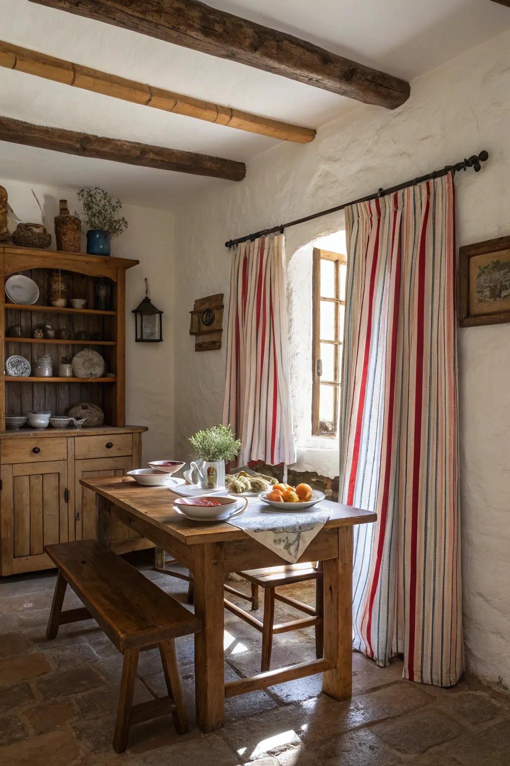 Striped curtains enhancing the appeal of a rustic farmhouse dining area.