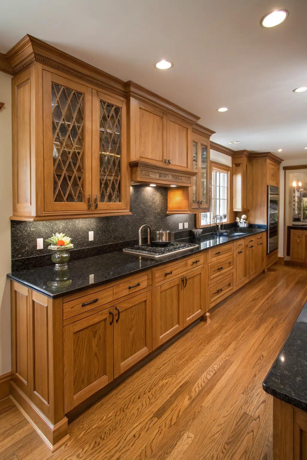 Deep hue worktops introduce an elegant contrast to oak cabinetry.