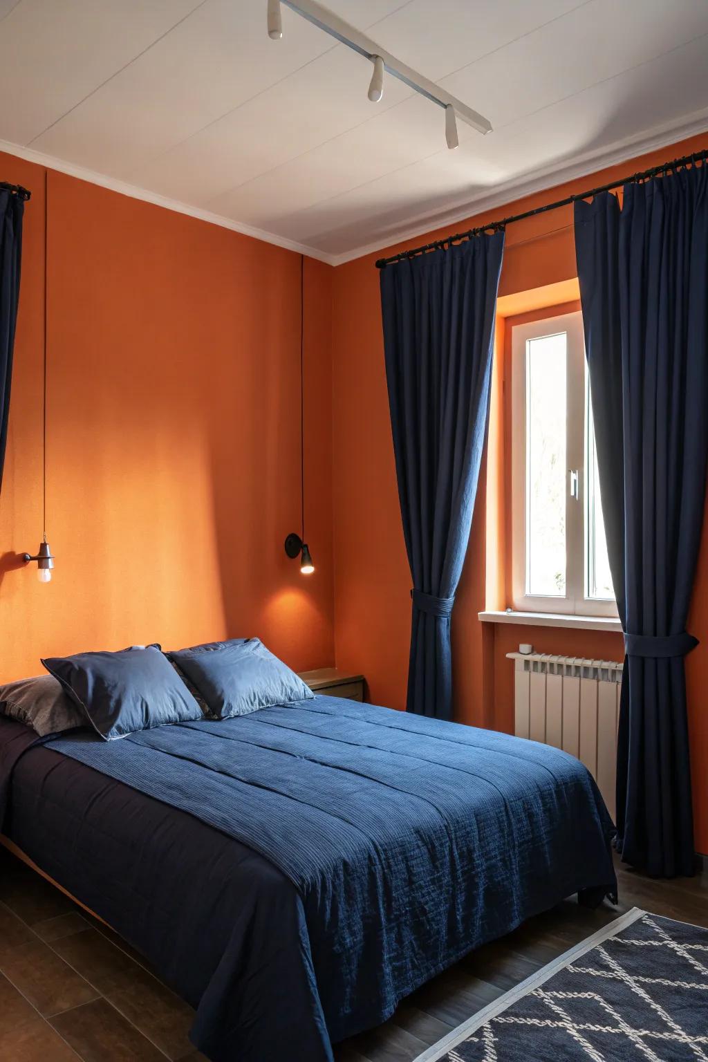 Navy features provide a soothing contrast against bold orange walls.