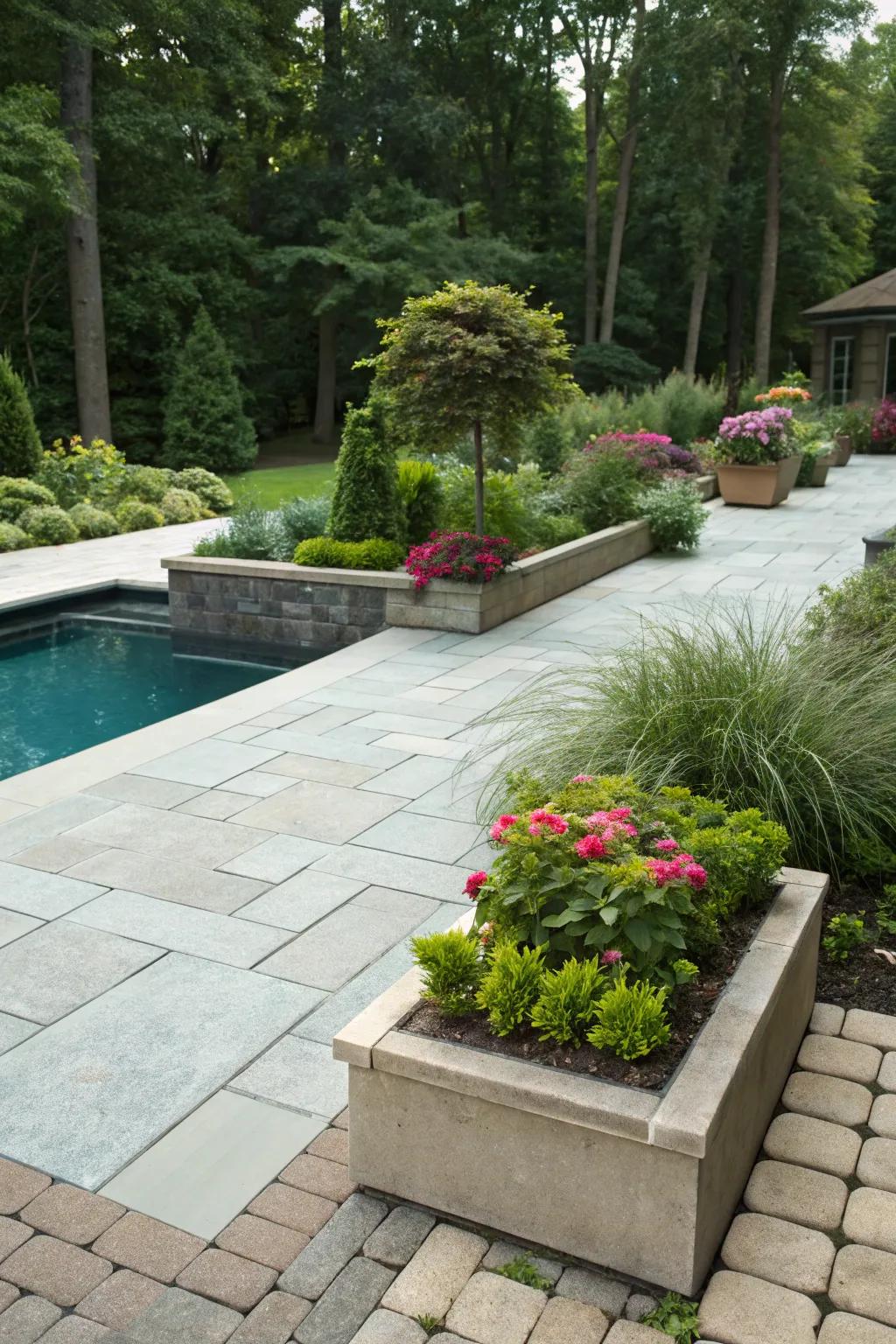 Integrating greenery with pavers creates a fluid link to the garden space.