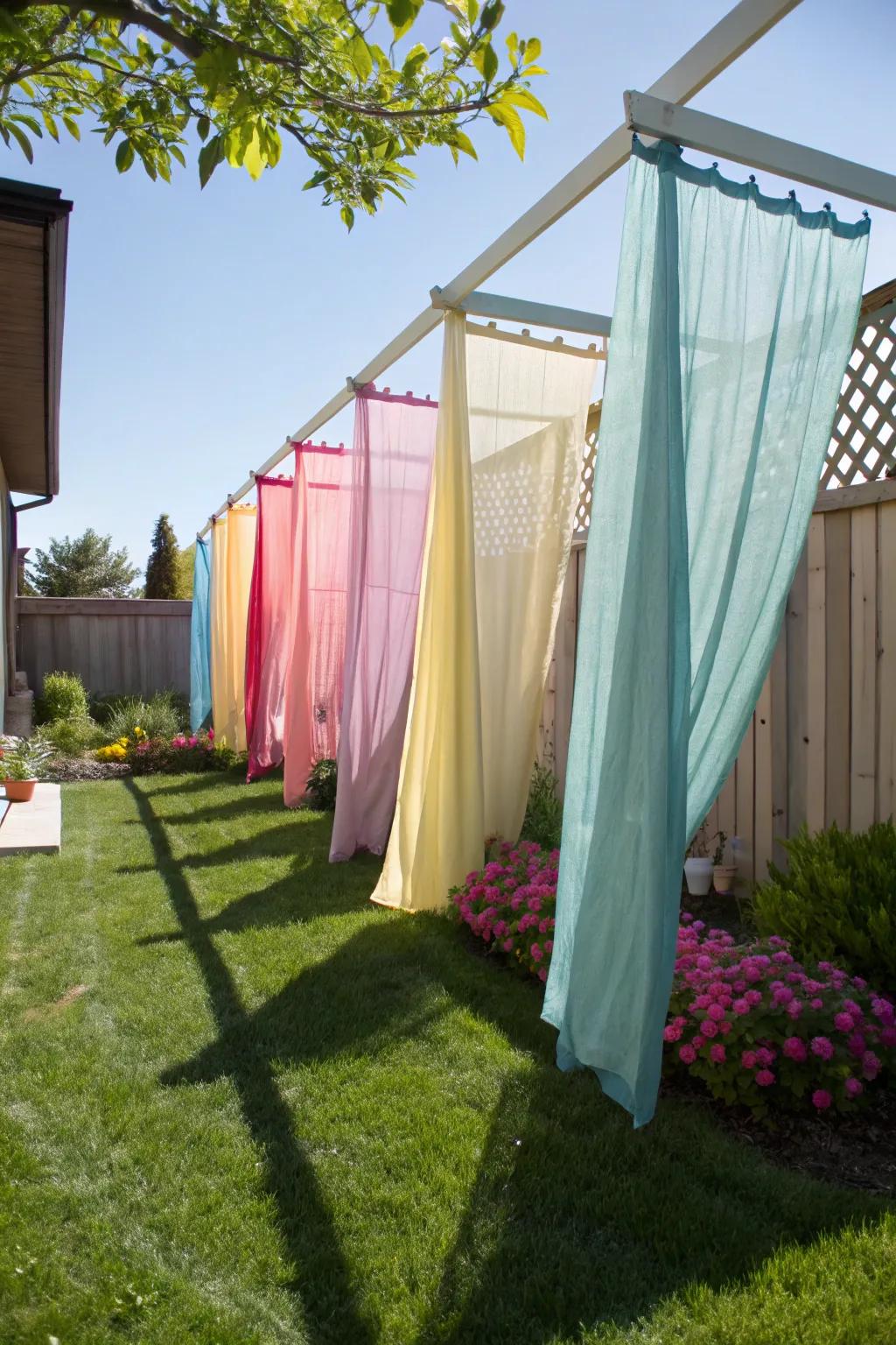 Textile dividers contribute a hint of color and privacy to any outdoor location.