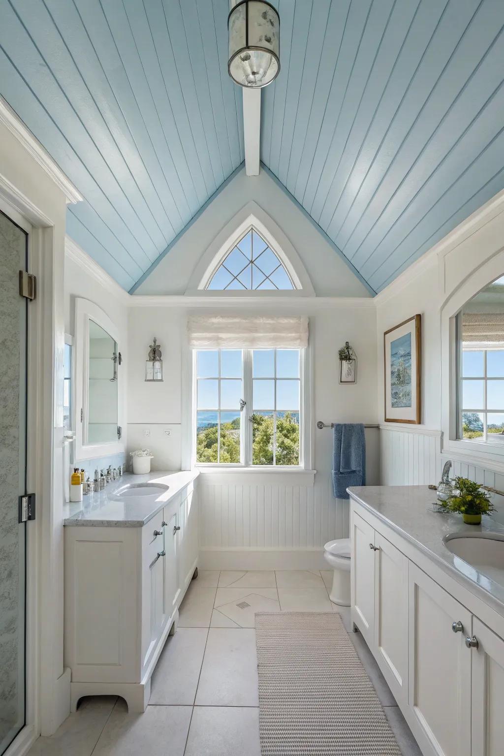 A sky tinted vaulted ceiling instills a serene mood in this bathroom.