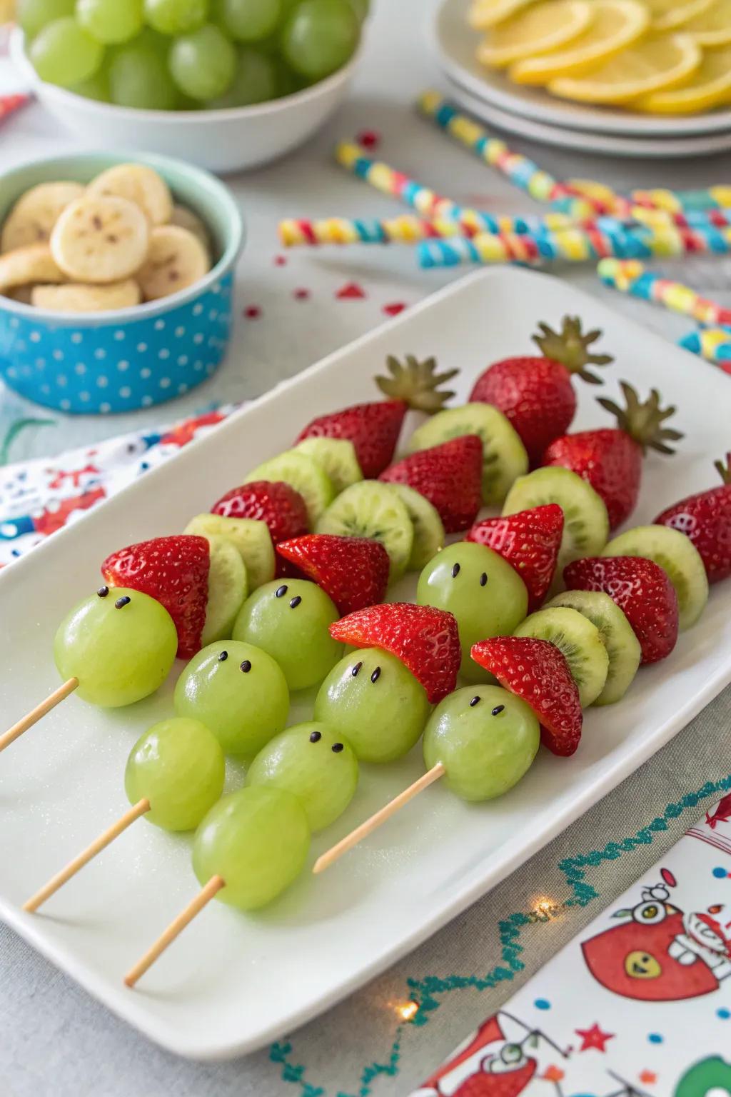 Quirky Grinch fruit skewers to brighten your holiday gathering.