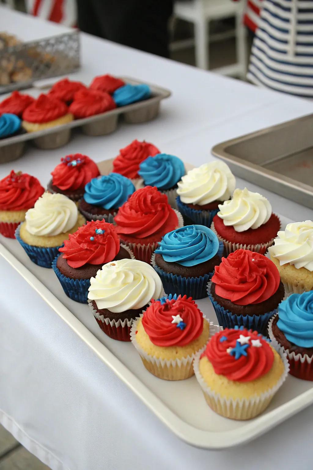Vibrantly decorated cupcakes contribute a sweet element to the celebration.