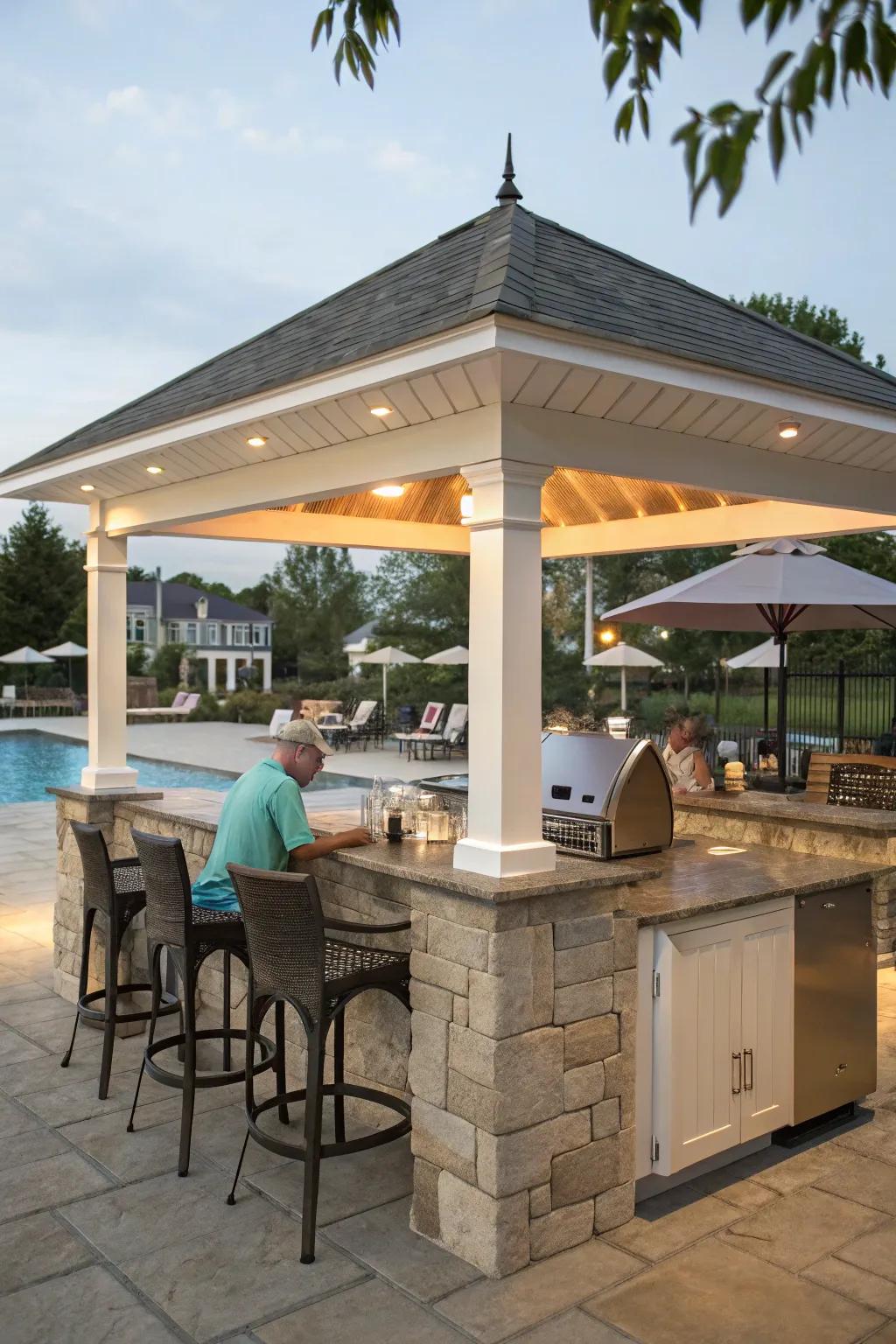 An outdoor kitchen pavilion is fantastic for poolside cooking and entertaining.