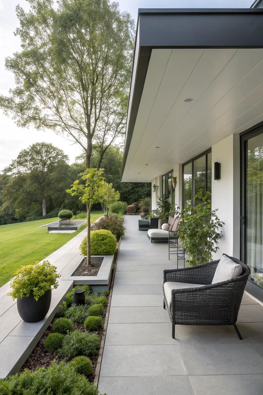 A chic, contemporary porch featuring a flat roof.