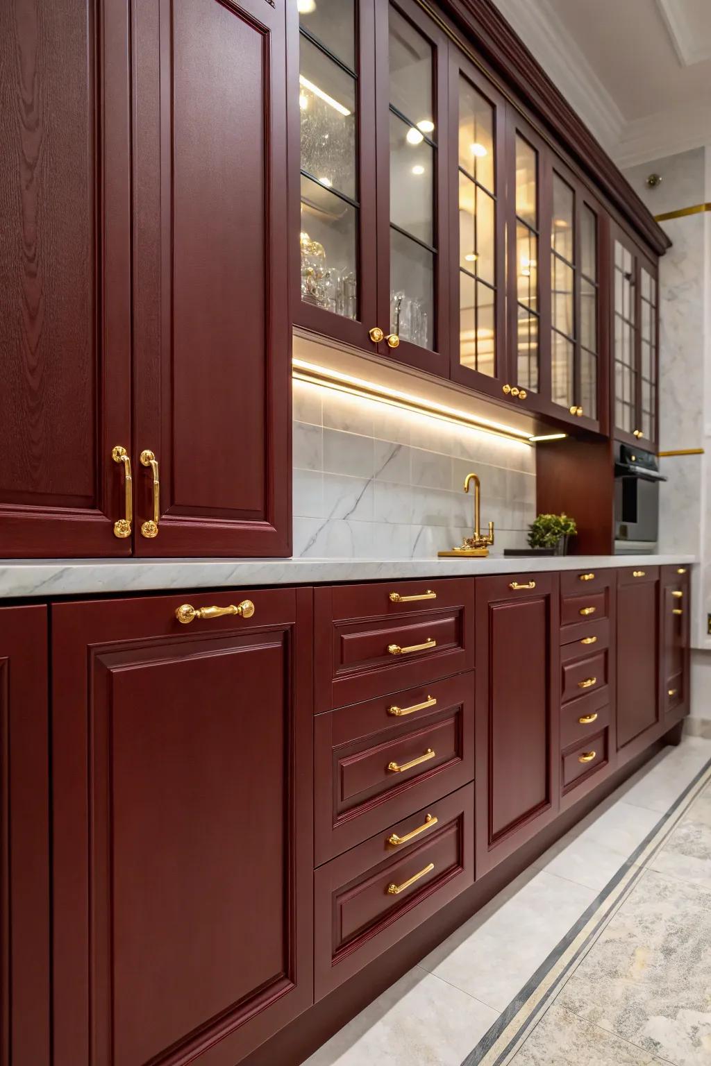 Lavish kitchen featuring crimson-toned cabinets and gilded accents.