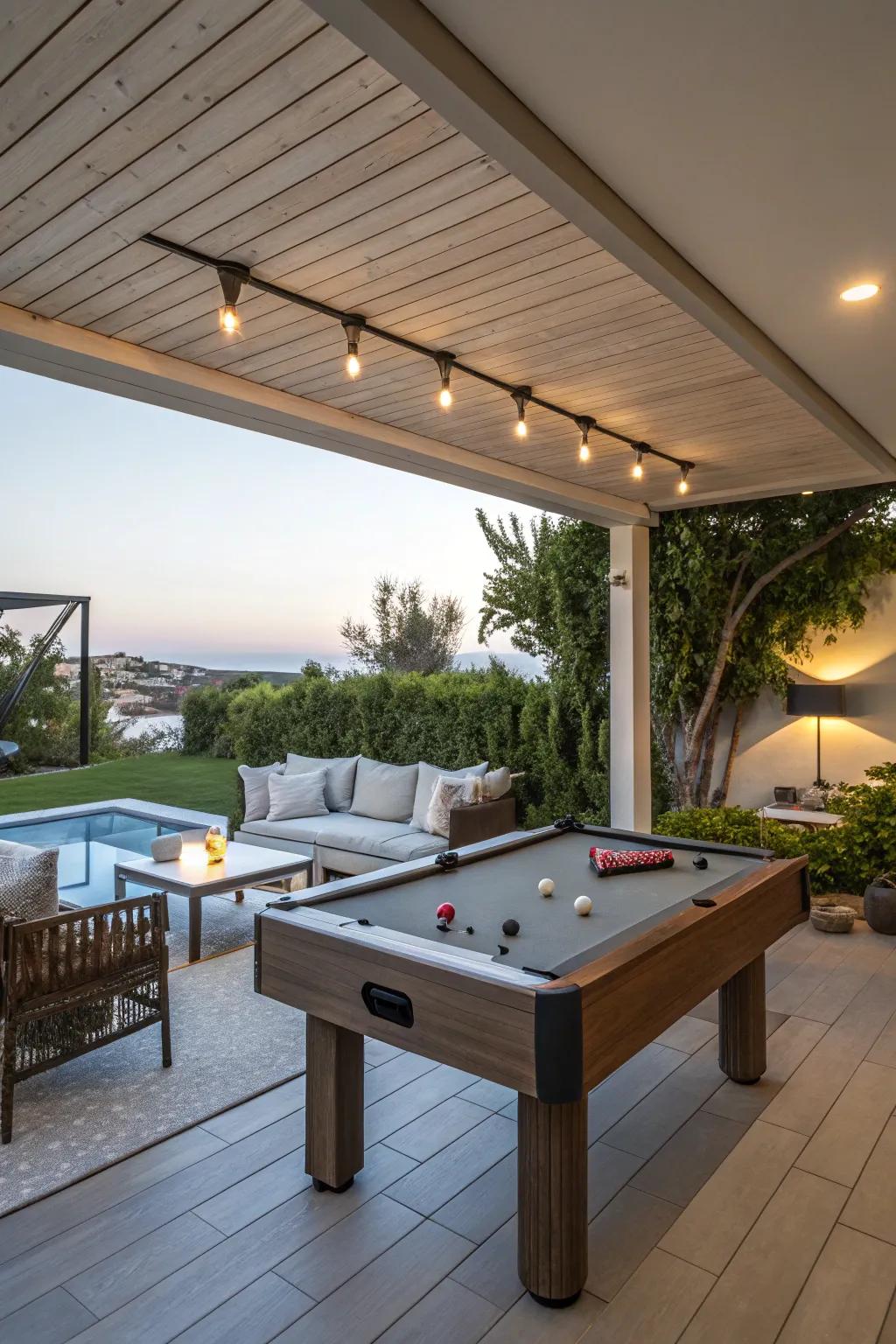 A multi-functional outdoor expanse featuring a billiard table and a tranquil lounge.
