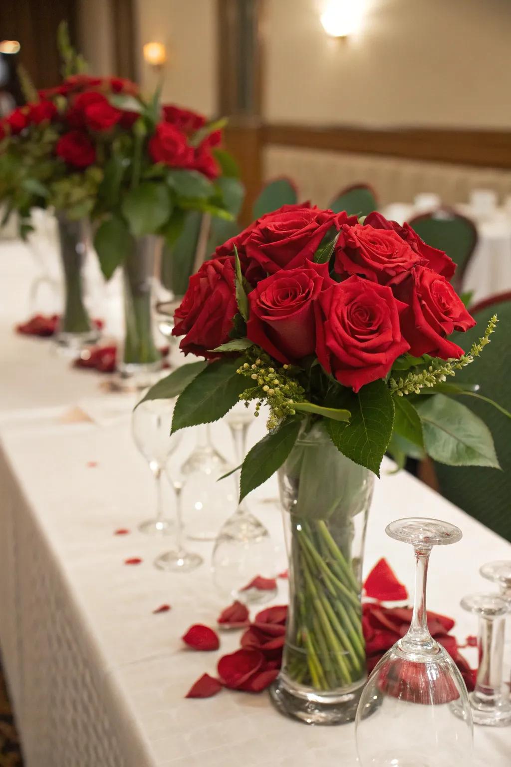 Ruby floral centerpieces adding refinement and scent to the atmosphere.