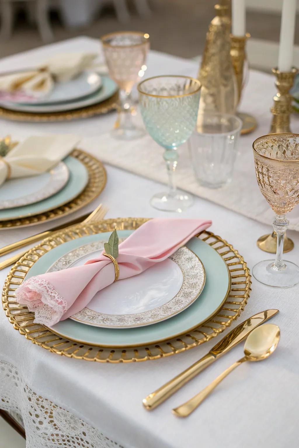 Elegant wedding tableware featuring gold highlights and delicate-colored cloths.