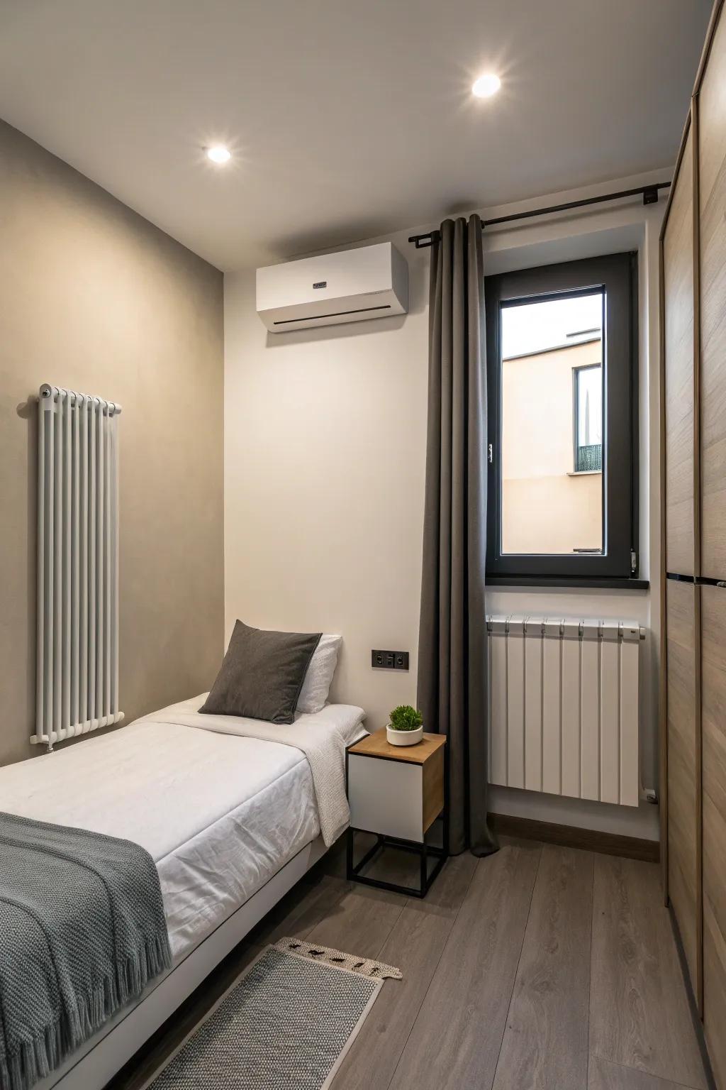 A small modern bedroom equipped with a streamlined wall-affixed heater for effective space heating.