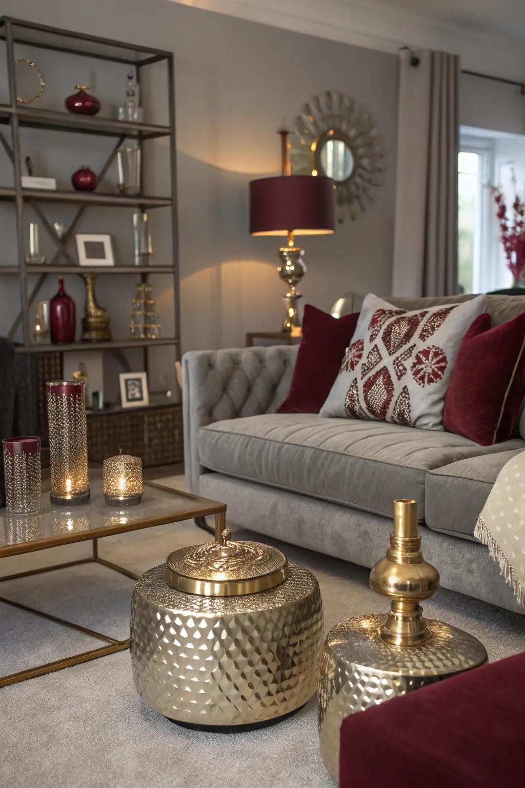 Living area featuring metallic touches and a neutral tone and carmine color scheme.