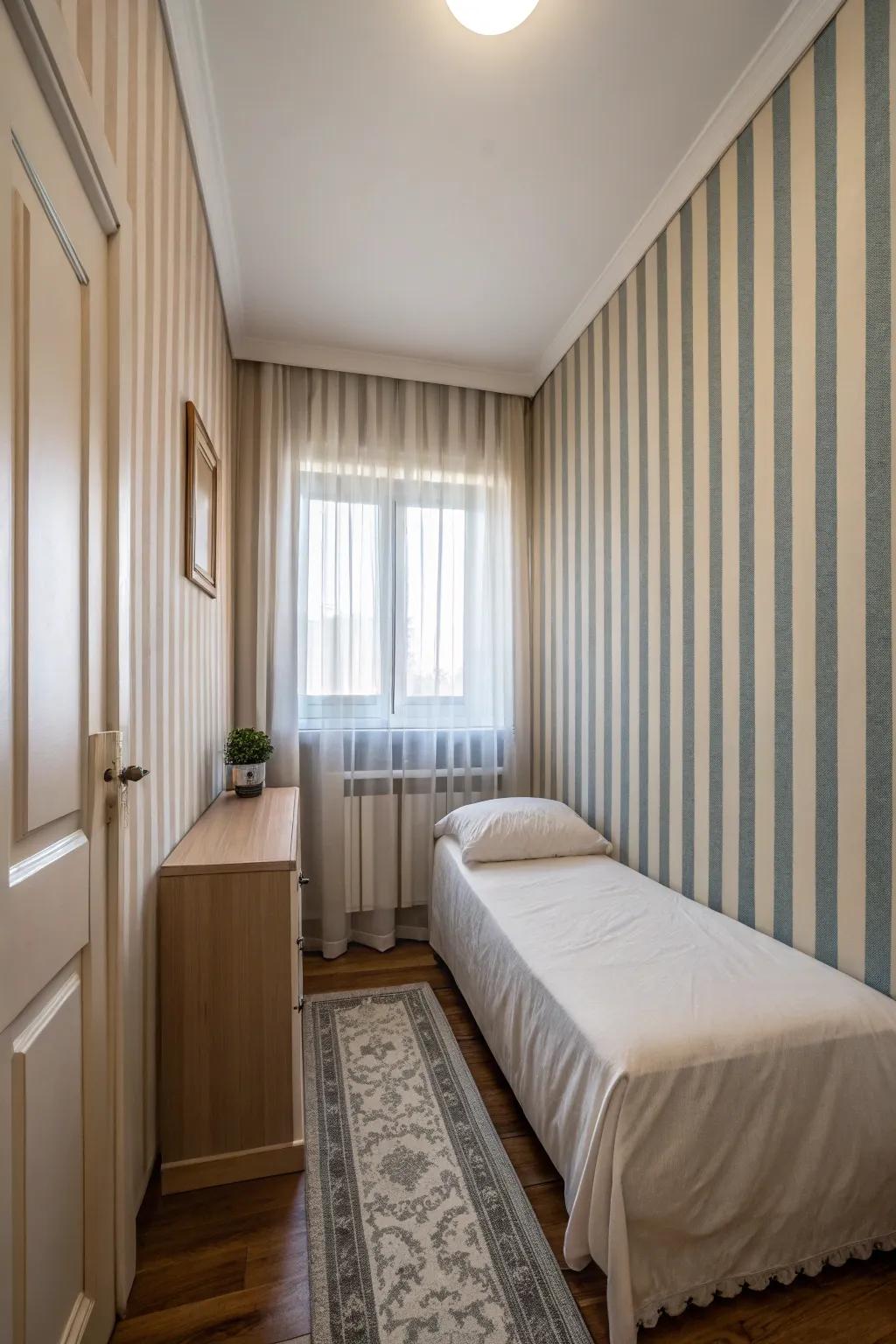 Upright stripes add height and visual interest in a slender bedroom.
