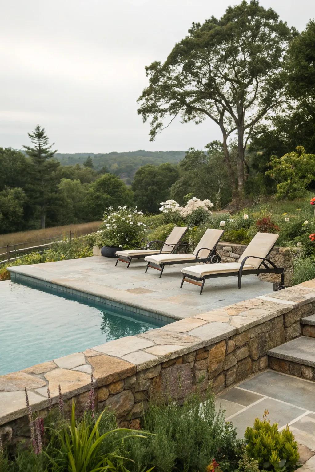 Authentic stone edging frames your pool with timeless elegance.