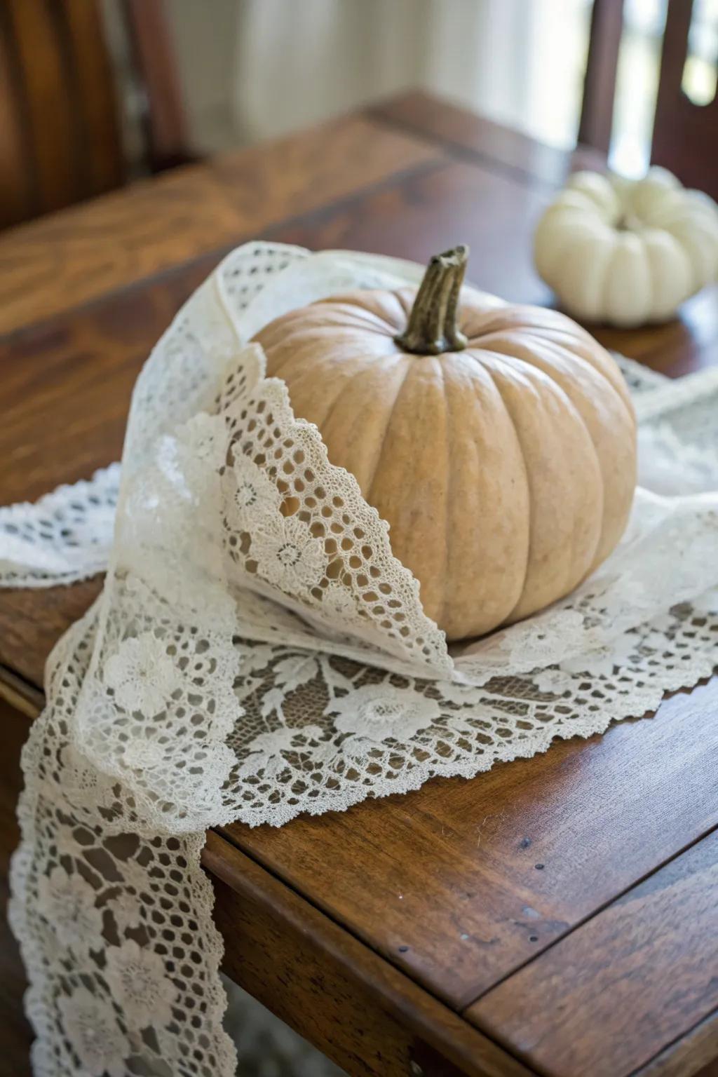 Lace-wrapped pumpkins radiate elegance and charm.