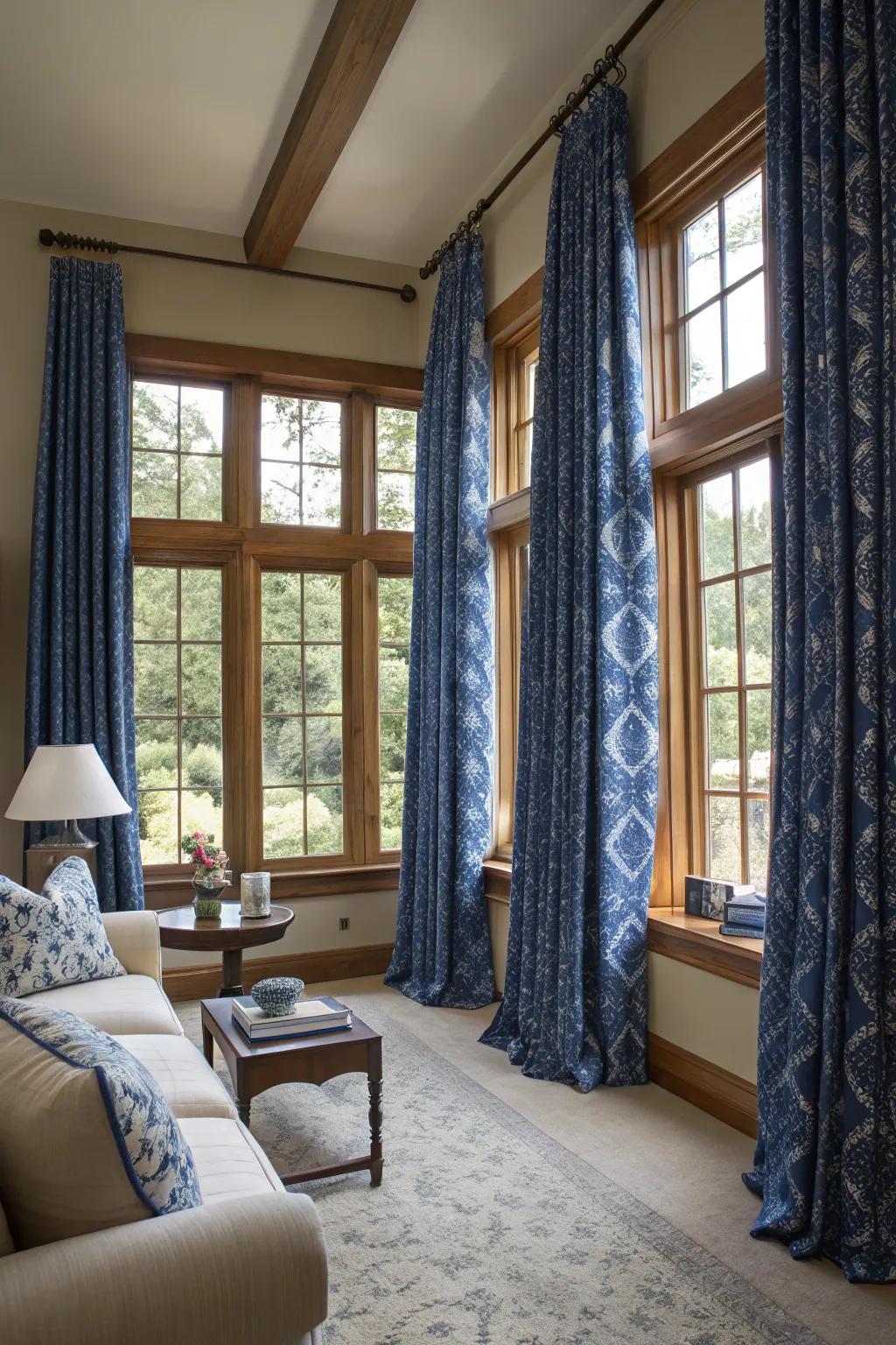 Patterned curtains in sapphire create a sophisticated frame for your living space.