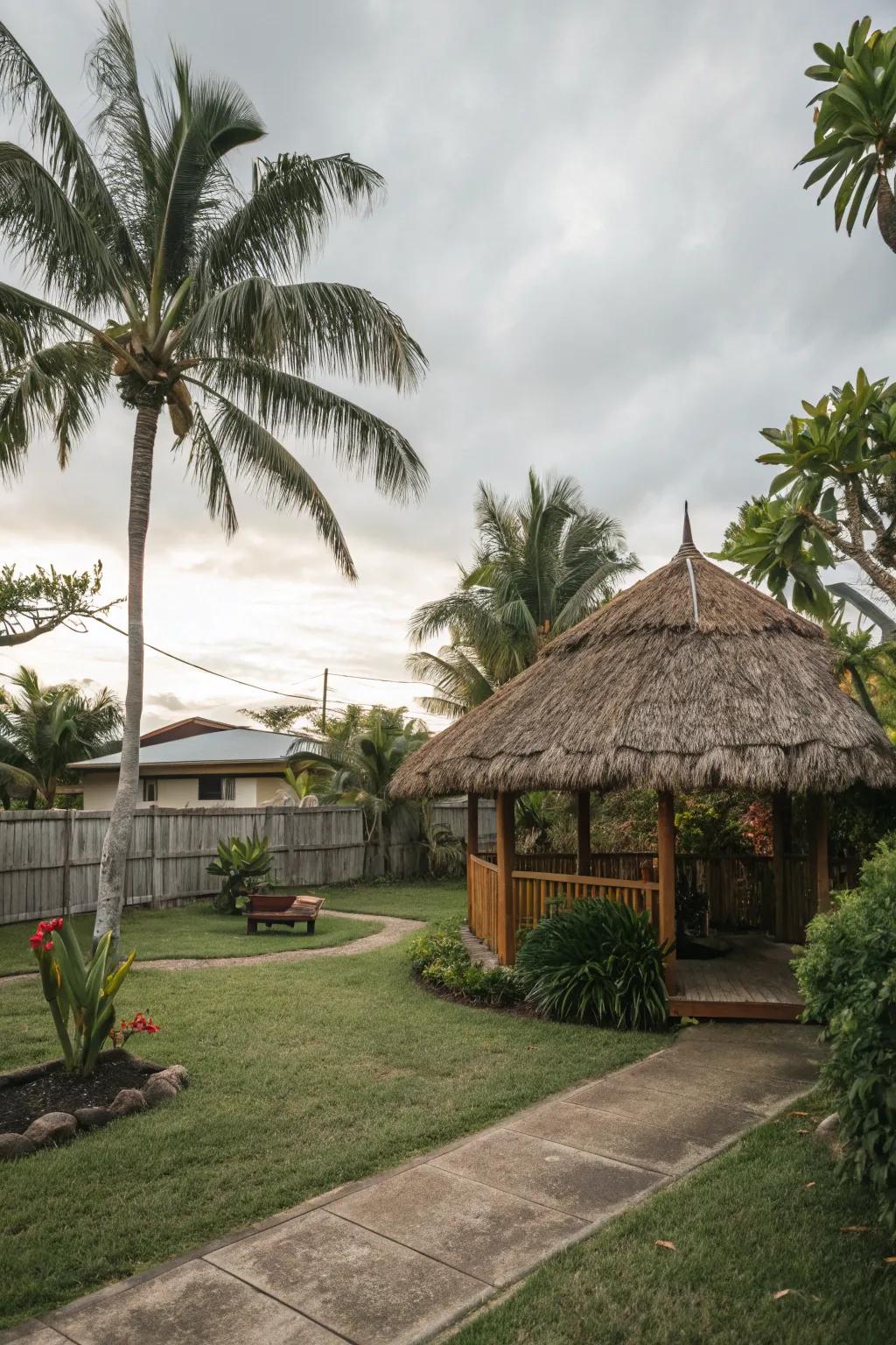 A thatched roof hut provides a shaded and comfortable spot in the backyard.