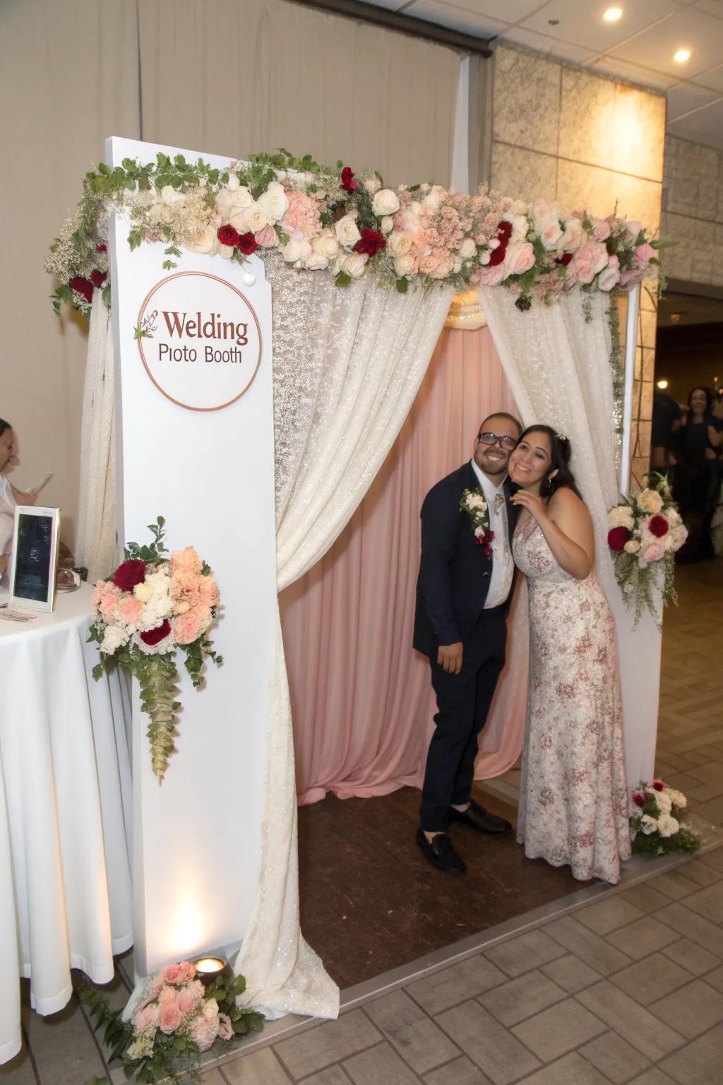A wedding photo booth featuring a charming and customized backdrop.