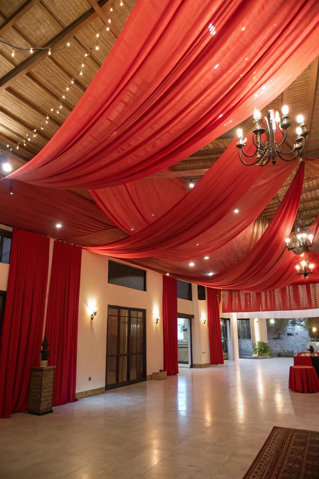 Crimson ceiling draperies append a bold and celebratory atmosphere to your abode.