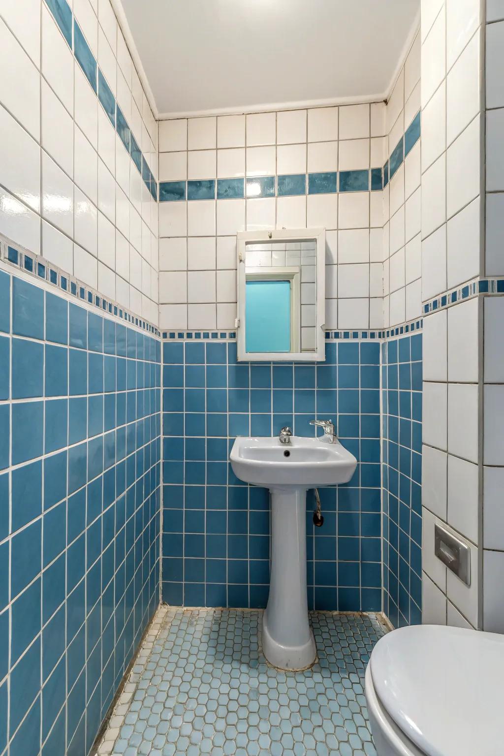 Blue tiles accented with white grout offer a tidy and refined appearance.