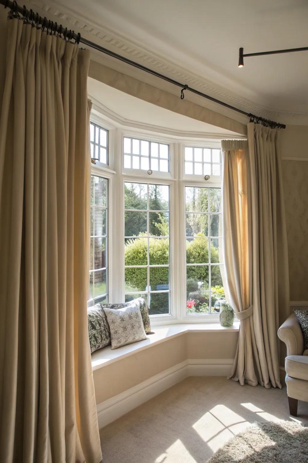 Striking curtain rods acting as highlight pieces for bay windows.