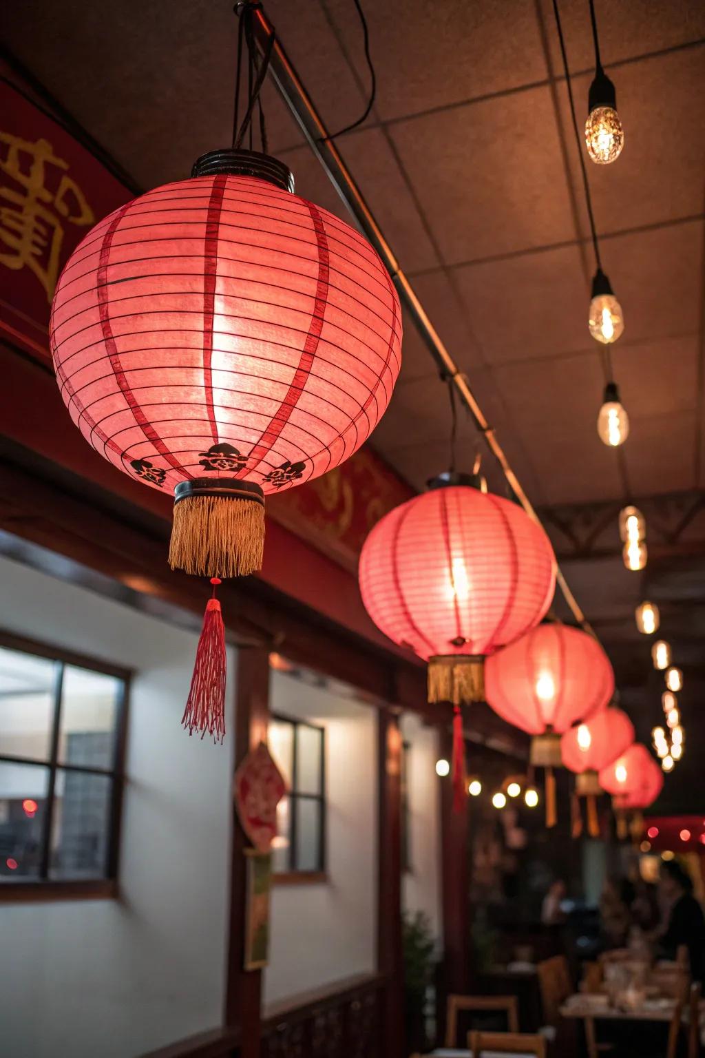 Red-tinted lanterns emitting a cozy, welcoming radiance at the celebration.
