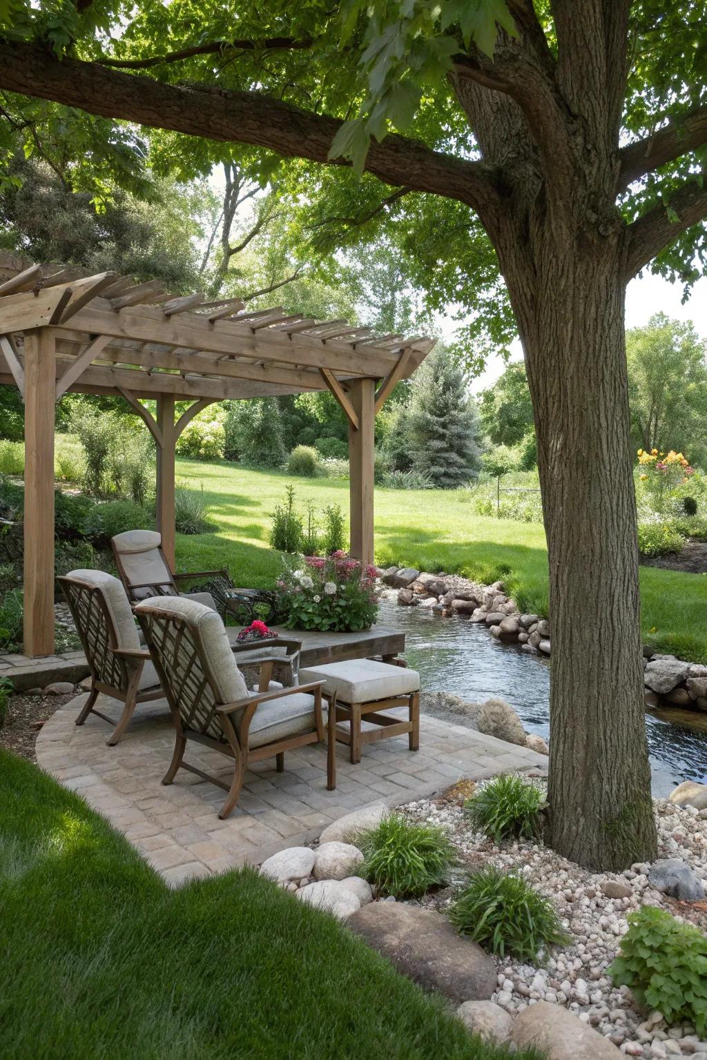 Shaded seating spaces offer a cozy refuge in your creekside environment.