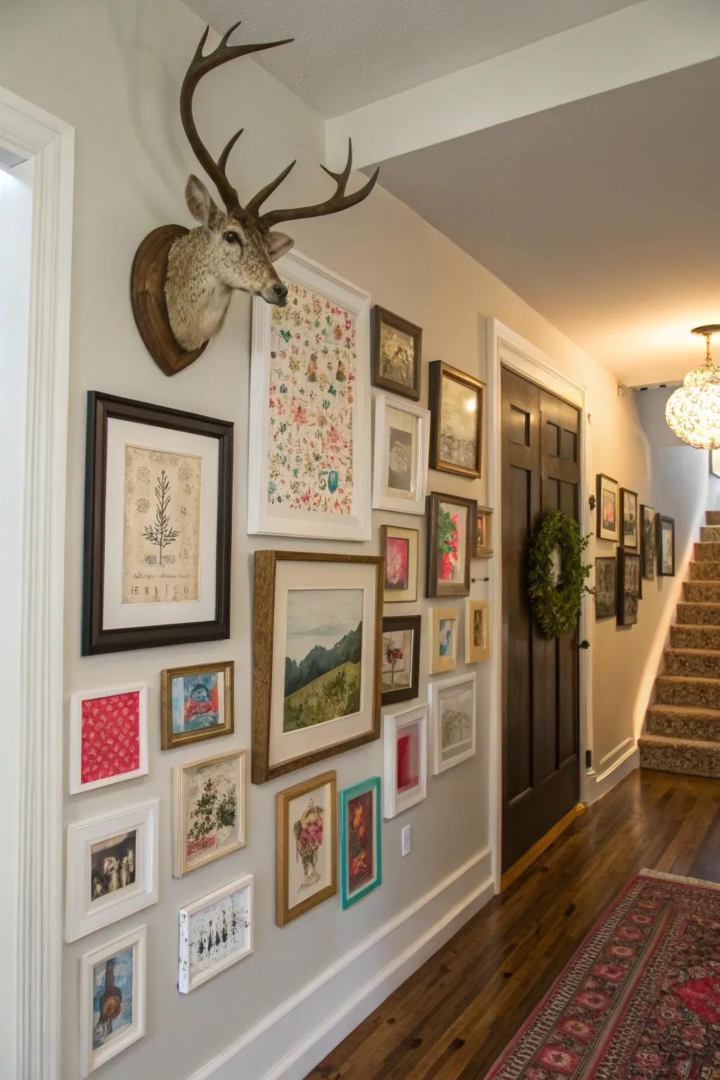An assorted gallery wall highlights a deer skull mount beautifully.